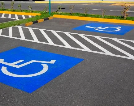 pavement markings used to outline designated parking spaces, including pwd spaces.