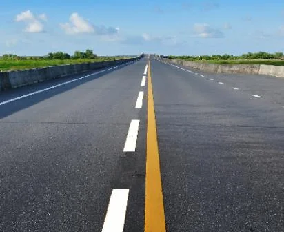 a pavement marking indicating different overtaking and crossing rules.