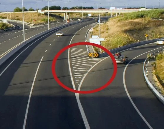 a pavement marking guiding traffic safely around obstructions.